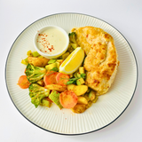 Стейк из куриной грудки с овощами в сырно-лимонном соусе