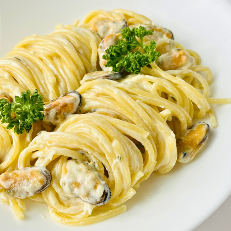 Шпагете са дагњама у кремастом сосу од сира